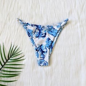 Blue and white tropical leaf print bikini bottom